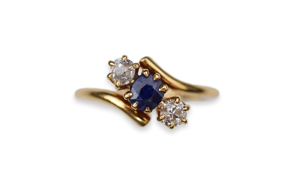A sapphire and diamond three-stone ring, early 20th century